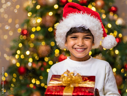 caucasian boy, happy with his christmas gift