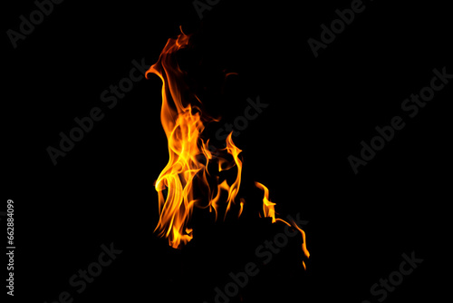 Fire flame texture. Burning material backdrop. Burn effect pattern. Blaze and torch wallpaper. Heat and haze backdrop. © Jozsef
