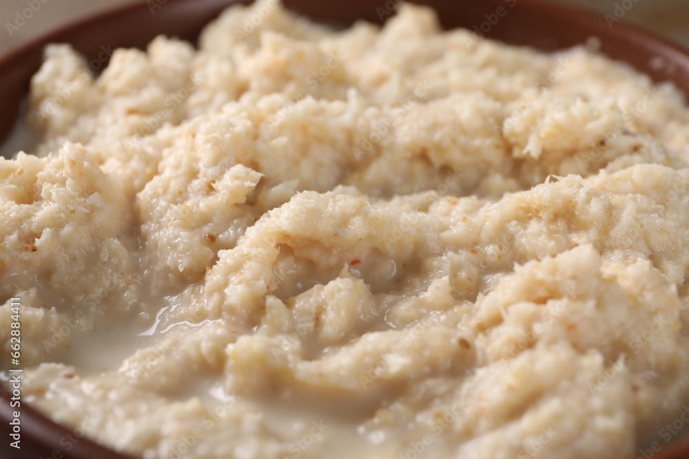 Spicy horseradish sauce in bowl, closeup view Spicy horseradish sauce in bowl, closeup view
