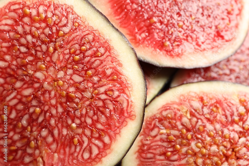 Pieces of fresh ripe figs as background, top view Pieces of fresh ripe figs as background, top view
