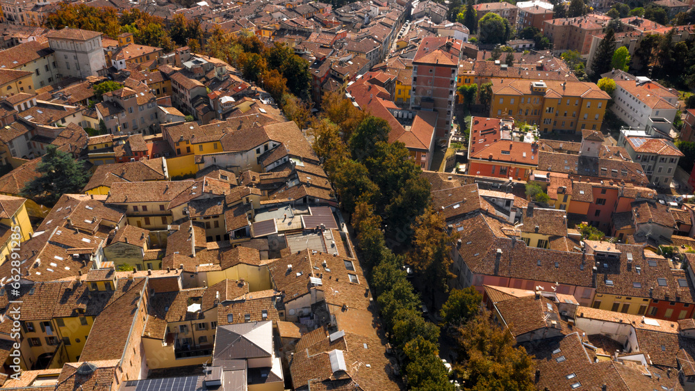 Aerial view of the historic center of Reggio Emilia, Italy. You can see the typical roofs of medieval Italian architecture.