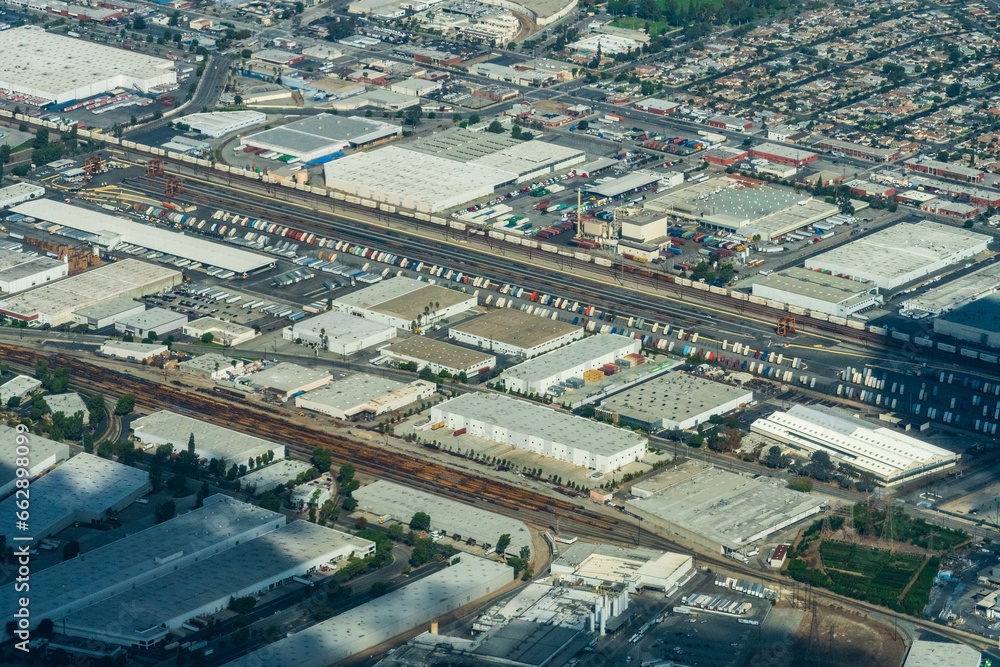 Aerial view of Los Angeles featuring the city of Commerce, Vernon and the BNSF - Hobart Intermodal Freight Transport Train hub 