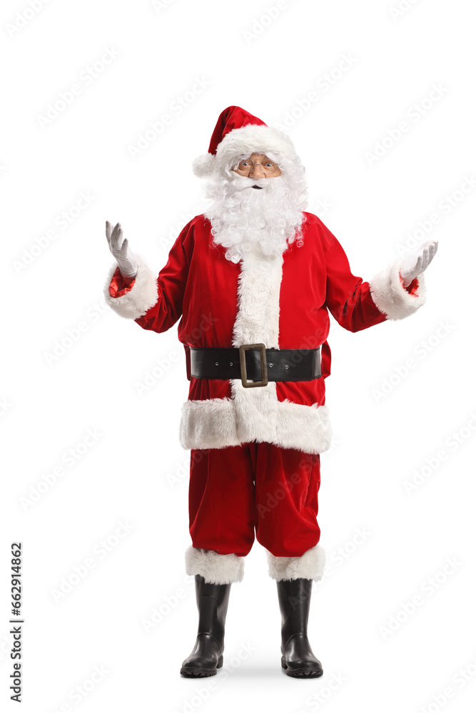 Full length portrait of santa claus explaining something with hands Full length portrait of santa claus explaining something with hands