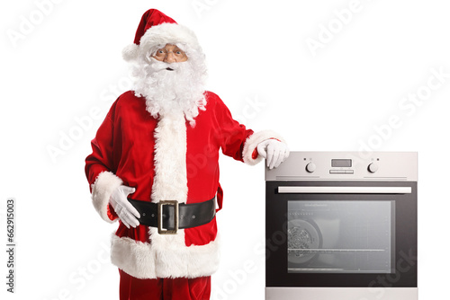 Santa claus posing with an oven