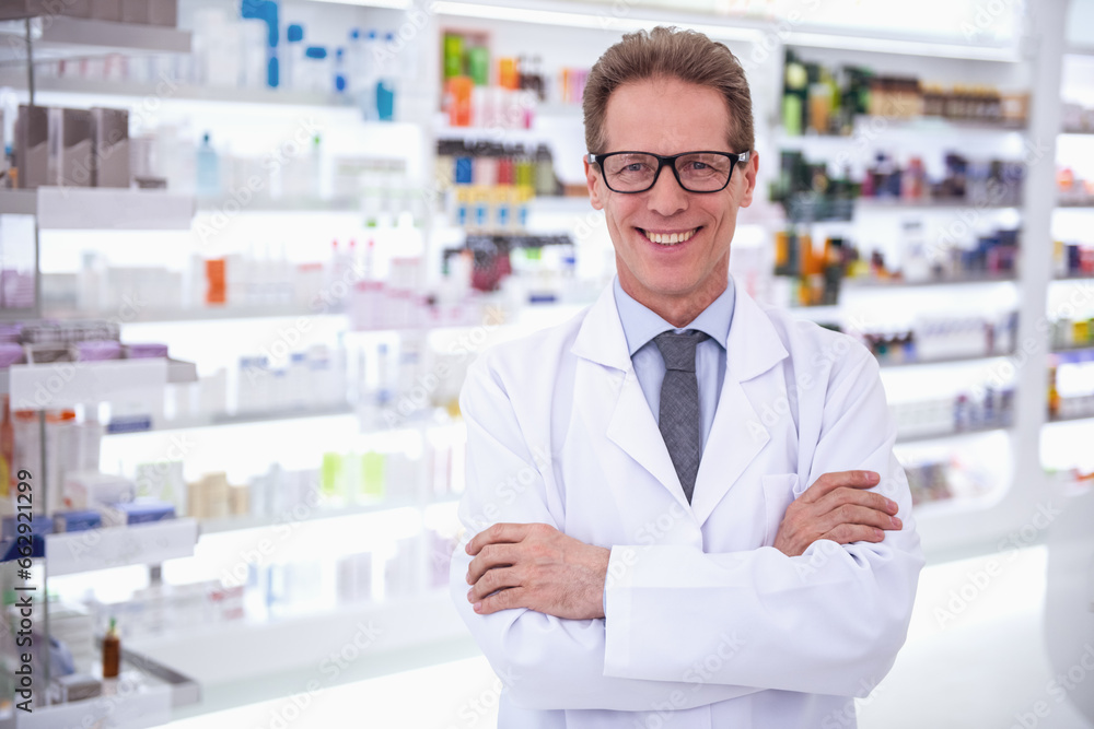 Handsome pharmacist working Handsome pharmacist working