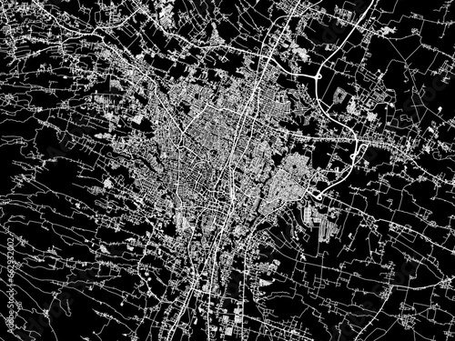 Vector road map of the city of Malang in Indonesia with white roads on a black background.