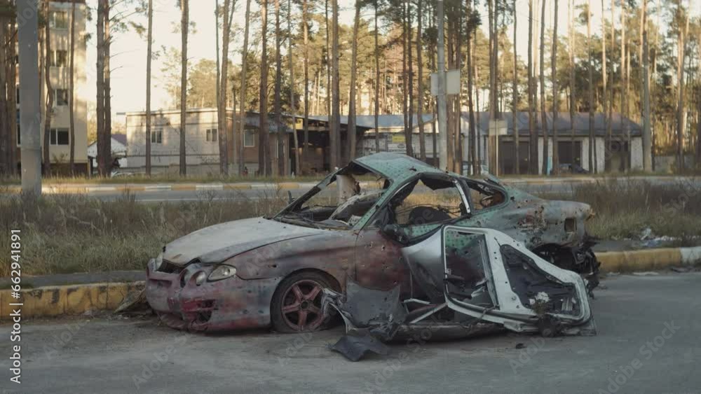 War-destroyed car in Irpin, Bucha district, Ukraine War-destroyed car in Irpin, Bucha district, Ukraine