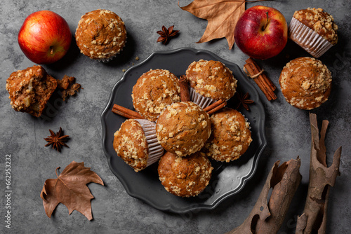 Apple cinnamon streusel muffins. Autumn pastry background. Homemade bakery. Grey background.
