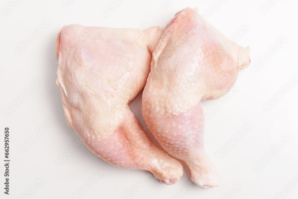 Fresh raw chicken meat legs on white background Fresh raw chicken meat legs on white background