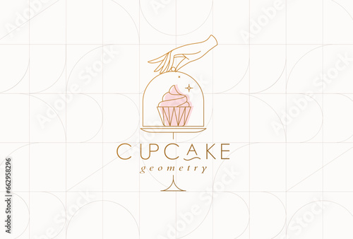 Obraz na płótnie Cake stand with cupcake in art deco style holding by hand drawing on beige background w salonie