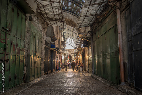 The local people and small stores are on the streets of Muslim Quarter in Jerusalem Old City, Israel.