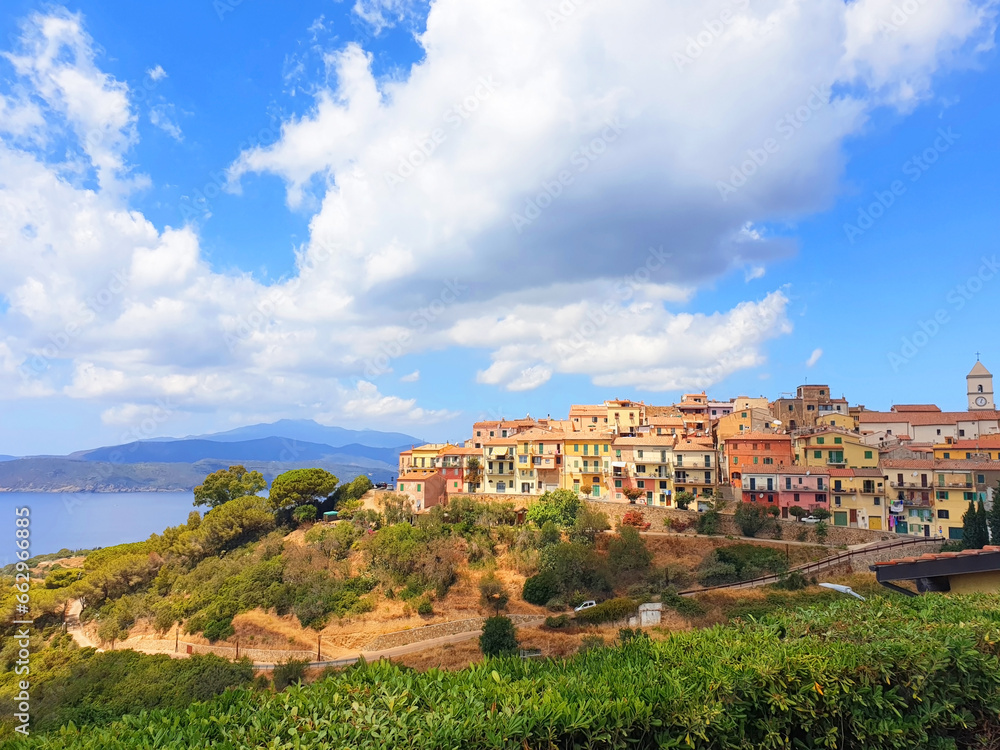 The town of Capoliveri overlooking the sea and mountains. The town of Capoliveri overlooking the sea and mountains.