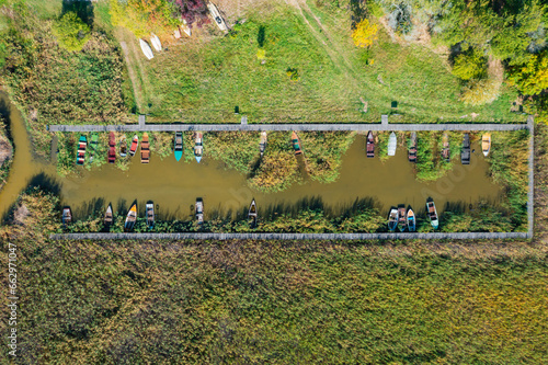 Pakozd, Hungary - Aerial top down view about fishing boats at Lake Velence. photo