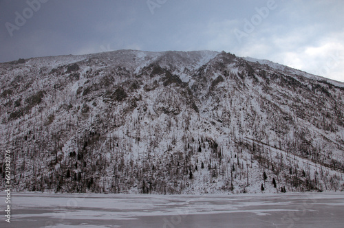 Snow-covered winter mountain lake, Russia, Siberia, Altai mountains. Multinskie lakes. photo