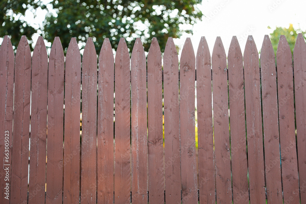 wooden fence in a serene countryside setting, bathed in warm sunlight, evoking nostalgia and the beauty of rural simplicity wooden fence in a serene countryside setting, bathed in warm sunlight, evoking nostalgia and the beauty of rural simplicity