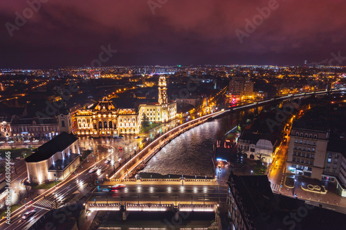 Aerial art nouveau historical a scenic cityscape with a meandering river flowing through the historic streets of Oradea captured from a bird s eye view incity Oradea  Bihor  Romania