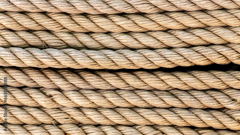 Background texture close-up of old rope coiled Background texture close-up of old rope coiled