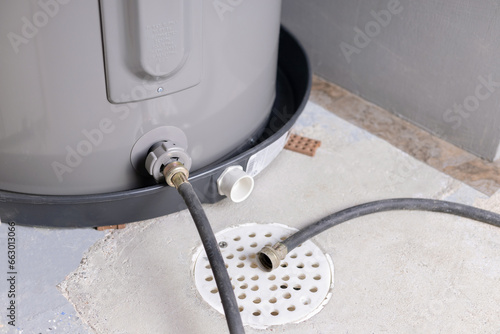 Tablou pe pânză Hose connected to water heater drain valve