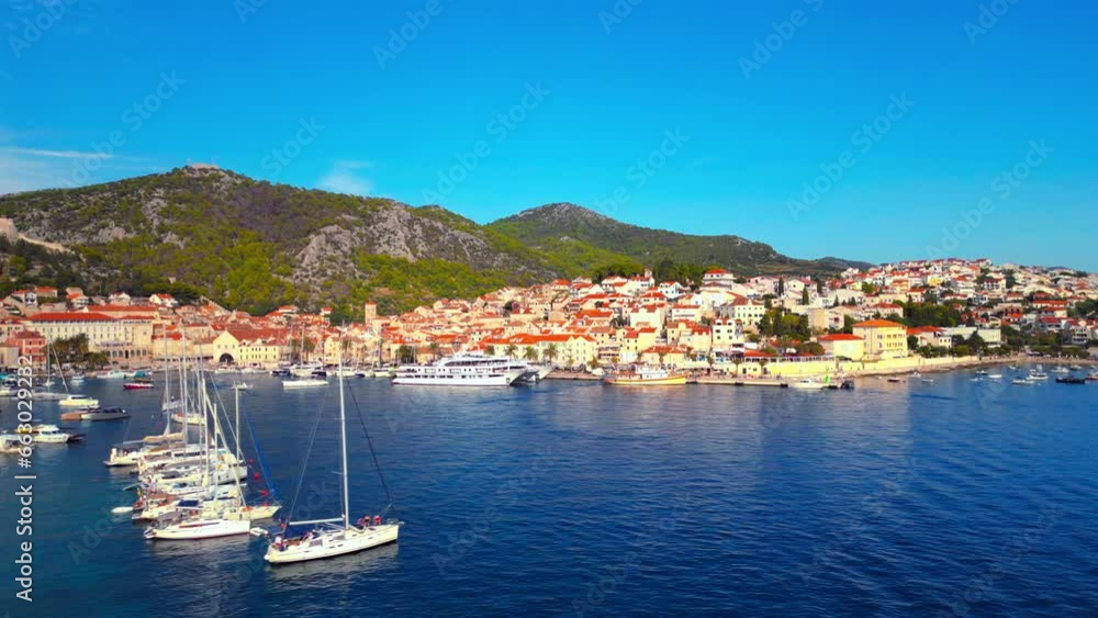 Aerial drone view of Hvar, Croatia during the daytime in the harbor. Aerial drone view of Hvar, Croatia during the daytime in the harbor.