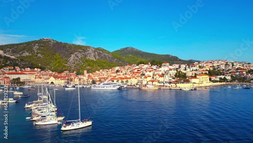 Aerial drone view of Hvar, Croatia during the daytime in the harbor.