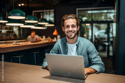 Smiling Young Man in Contemporary Workspace