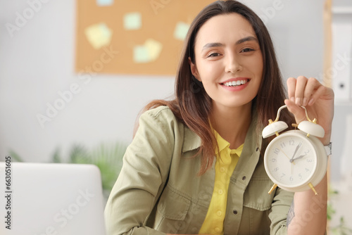 Young businesswoman with al...