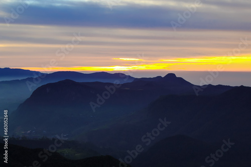The sunrise sky and the morning mist at the Adam's Peak, Sri Lanka