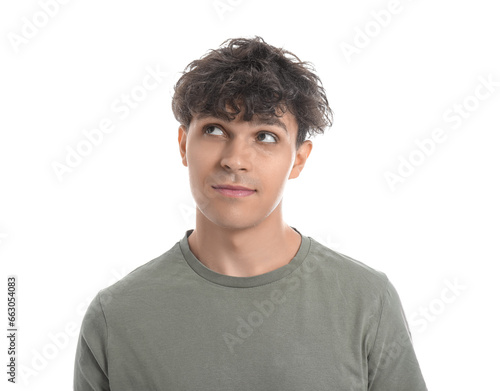 Portrait of pondering young man isolated on white background
