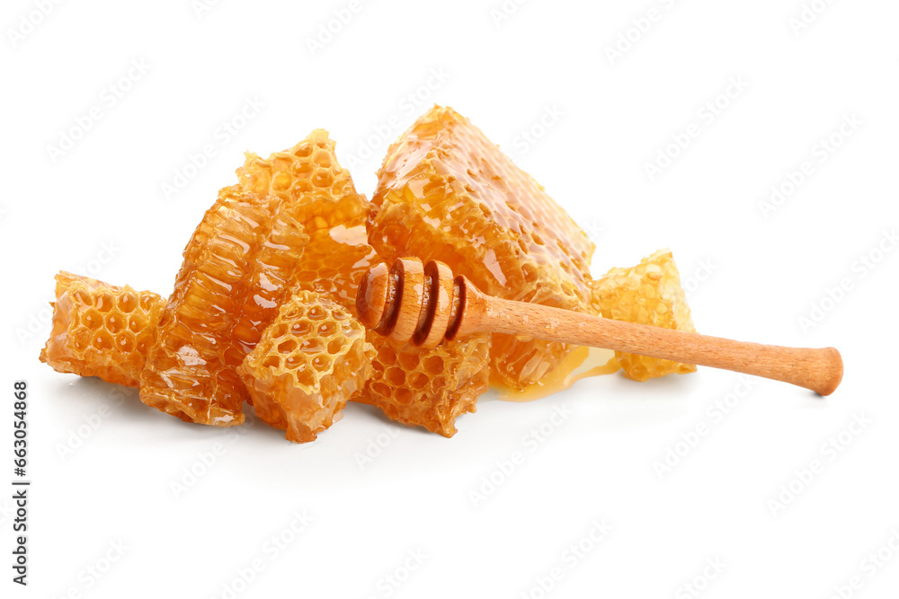 Sweet honeycombs and dipper on white background Sweet honeycombs and dipper on white background