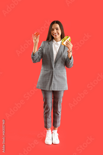 Young businesswoman with ta...