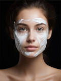 Beautiful Young Woman applying facial cream. fresh Healthy Skin, Beauty Cosmetics and Facial treatment.