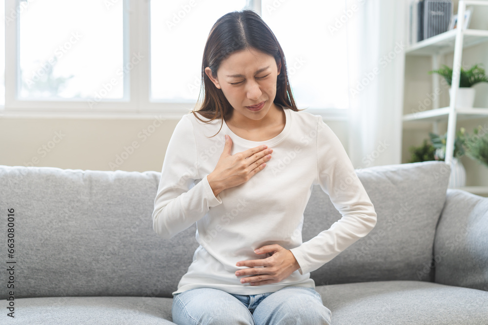 Acid reflux disease, suffer asian young woman have symptom