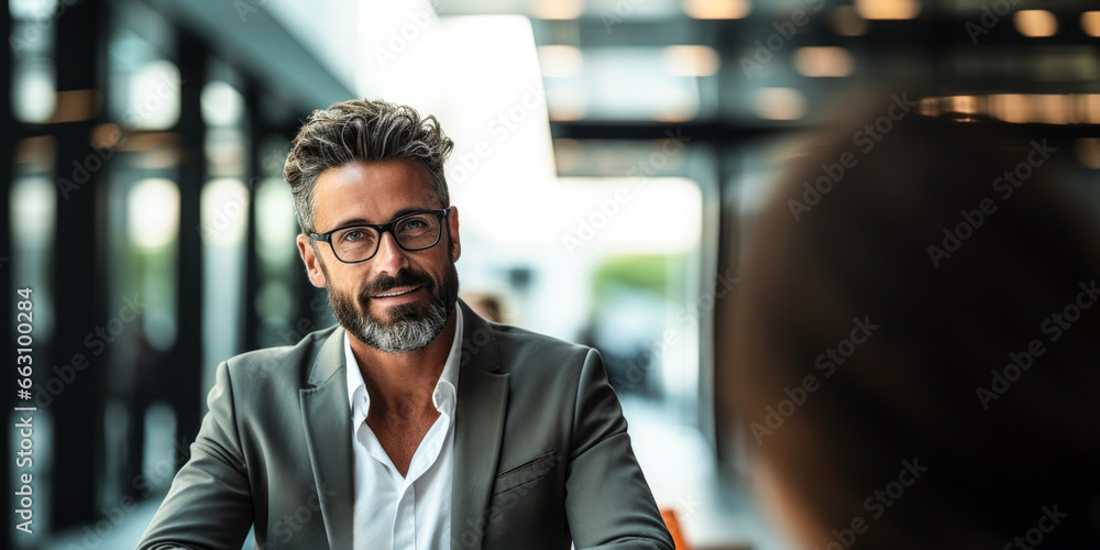 Fototapeta premium Up-Close Portrait of a Compensation and Benefits Manager at Work