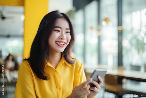 Portrait of Happy Asian Woman Holds Smartphone in Modern Office, Smiling Female Shopping Online, Bueatiful Manager Working Financial Reports with Mobile Application