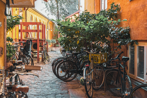 bicycle parking in the courtyard of house on old street of Copenhagen