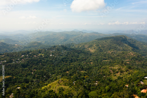 Mountain peaks covered with forest. Slopes of mountains with evergreen vegetation. Sri Lanka.