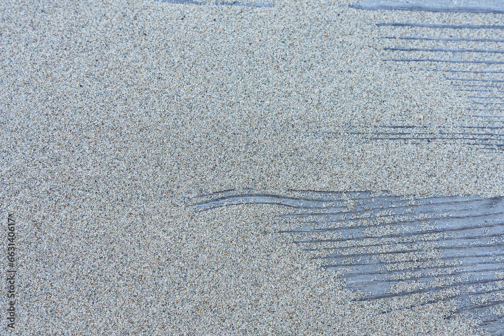 Naklejka premium Close up of beach sand texture background with copy space for design.