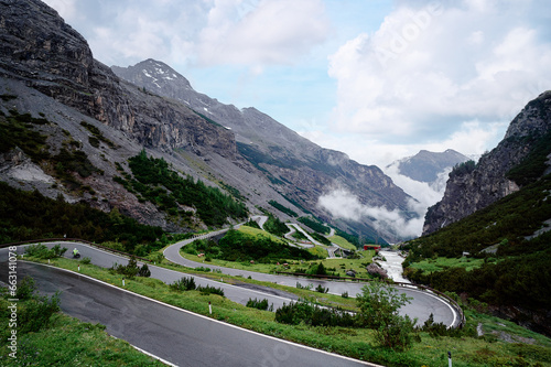 Asphalt serpentine road in Alps mountains. Road trip concept. Beautiful landscape. © luengo_ua