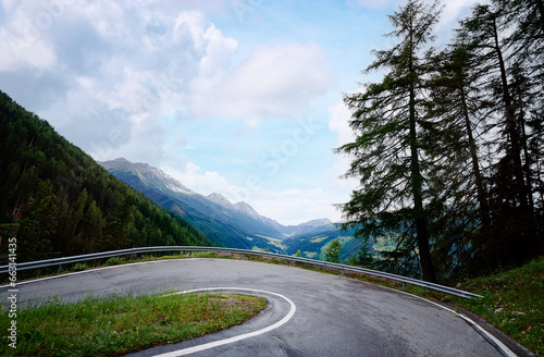 Asphalt road in Alp mountains. Road trip concept. Beautiful landscape. © luengo_ua