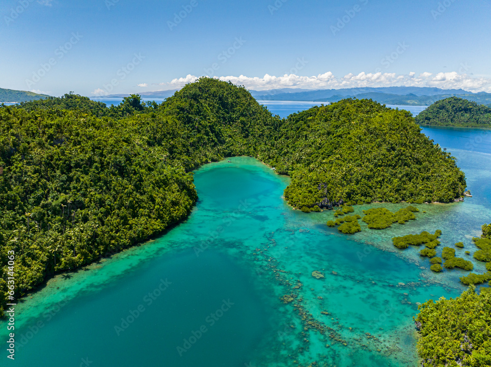 Turquoise water in lagoon with coral reefs in Tinago Island. Mindanao, Philippines.