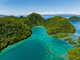 Turquoise water in lagoon with coral reefs in Tinago Island. Mindanao, Philippines.
