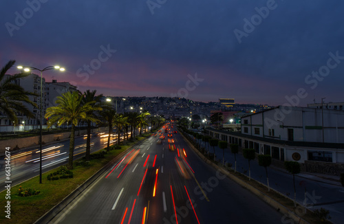 Highway in Algiers  Alger  Algeria by night. Long exposure with rays of light coming from the vehicles.