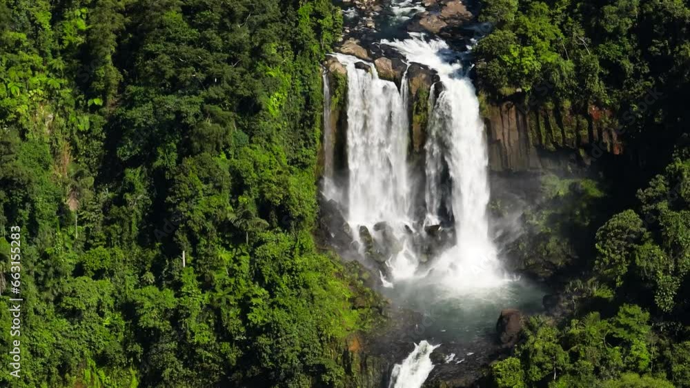 Limunsudan Falls with white water stream over rocks. Mindanao, Philippines. Limunsudan Falls with white water stream over rocks. Mindanao, Philippines.