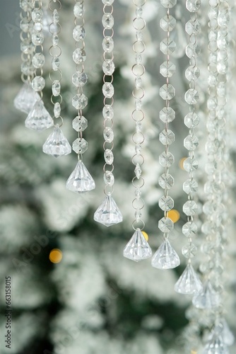 Close-up decorative crystal or glass pendants. Interior design. The concept of New year or Christmas. © Fotoproff