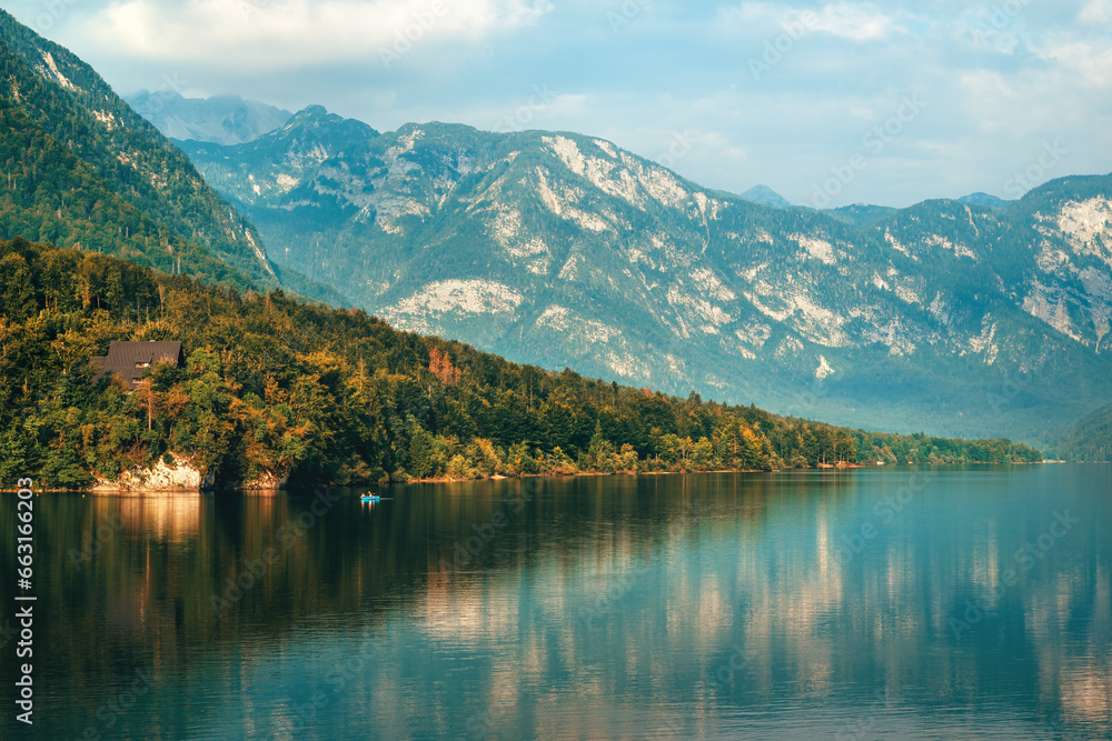 Beautiful Slovenian glacial lake Bohinj in front of mountain during the summer