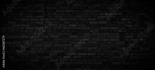 Abstract Black old cracks brick wall texture for pattern background. wide panorama picture. Black wall texture rough background dark concrete old grunge background black  template page web banner