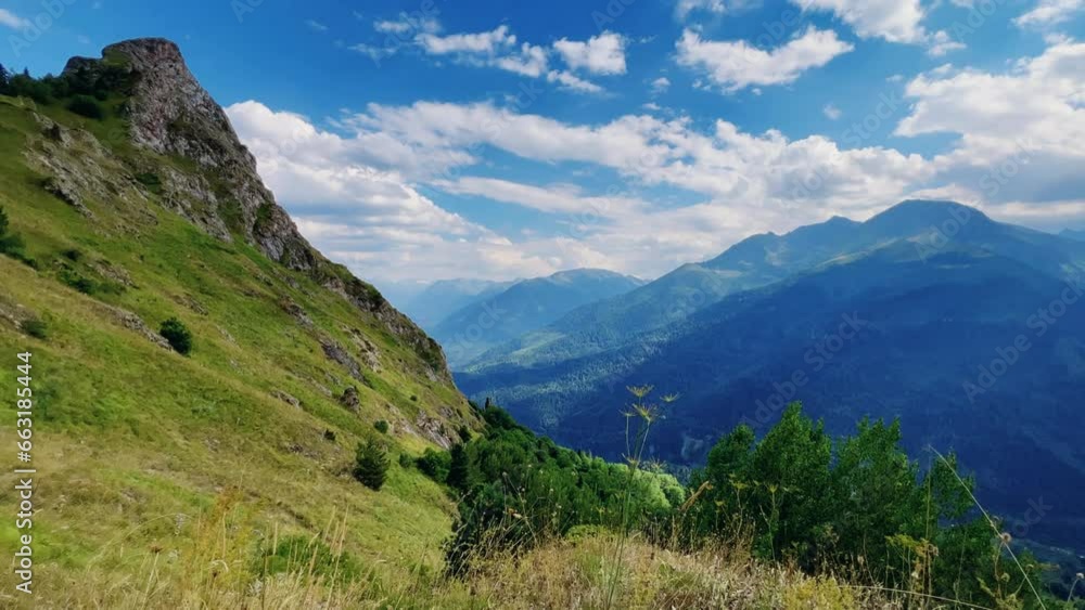 View of the mountain range near Mount Zakan. The top of the mountain node of the western part of the main ridge of the Greater Caucasus. Zakan Peak is the beginning of the Magisho mountain range. 4К View of the mountain range near Mount Zakan. The top of the mountain node of the western part of the main ridge of the Greater Caucasus. Zakan Peak is the beginning of the Magisho mountain range. 4К