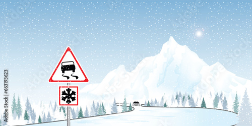 Road sign warns of ice and snow at winter.