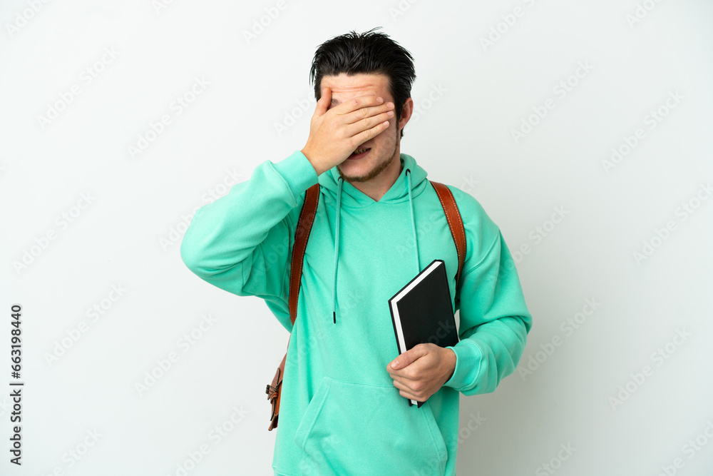 Young student man isolated on white background covering eyes by hands. Do not want to see something Young student man isolated on white background covering eyes by hands. Do not want to see something