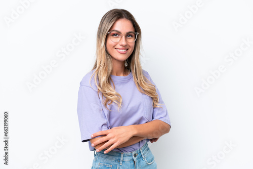 Young Uruguayan woman isolated on white background with arms crossed and looking forward